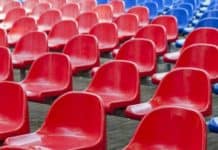 red and blue stadium seats_canstockphoto11540279 525x420
