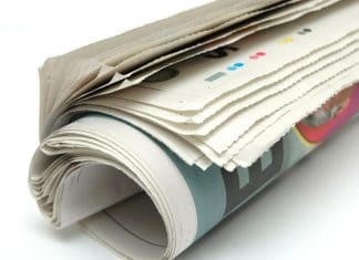 newspaper rolled