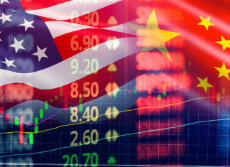 american flag with stock ticker next to chinese flag